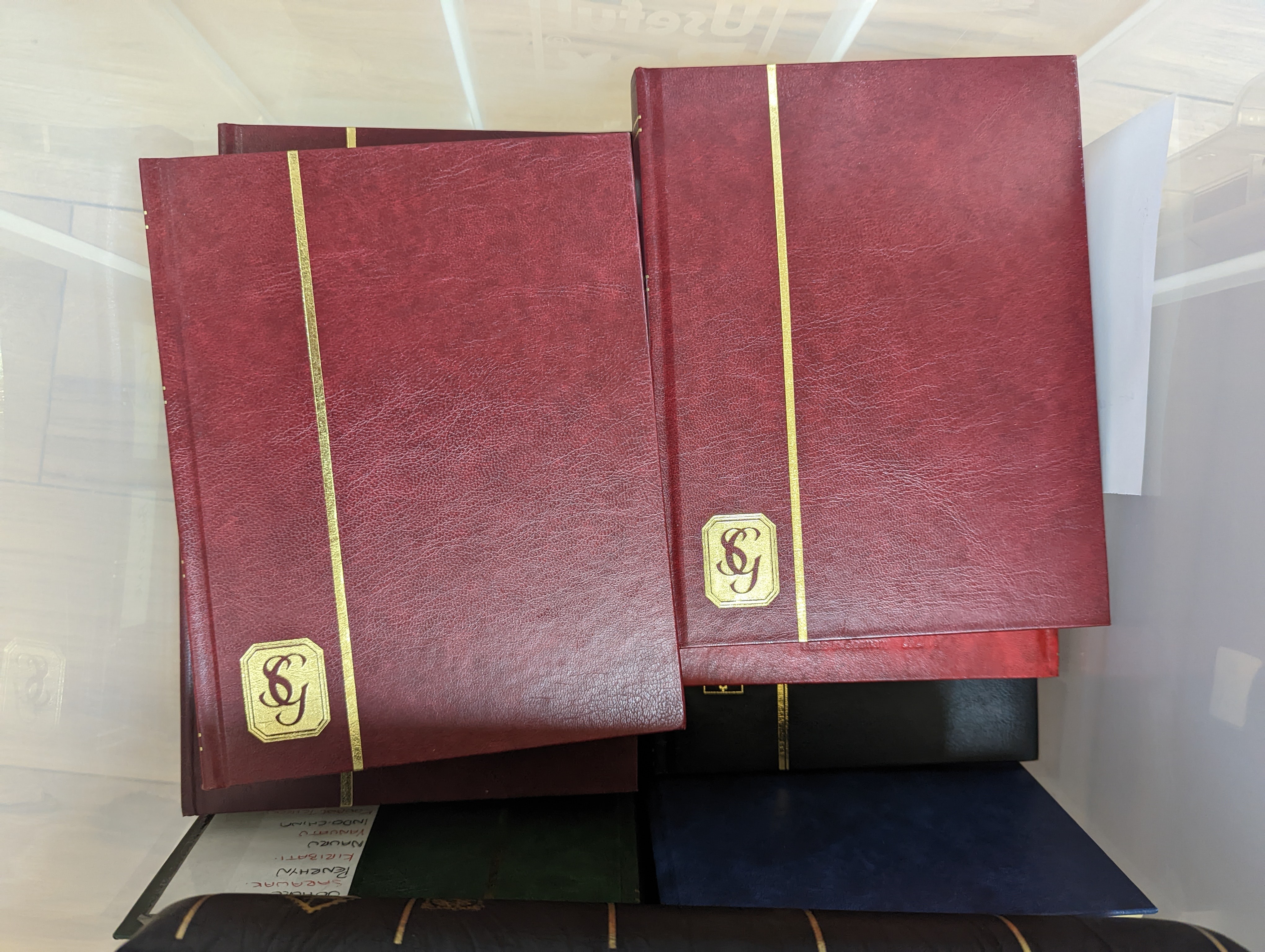 22 albums, stock books with Ceylon, India, China, Malaya, Gulf states